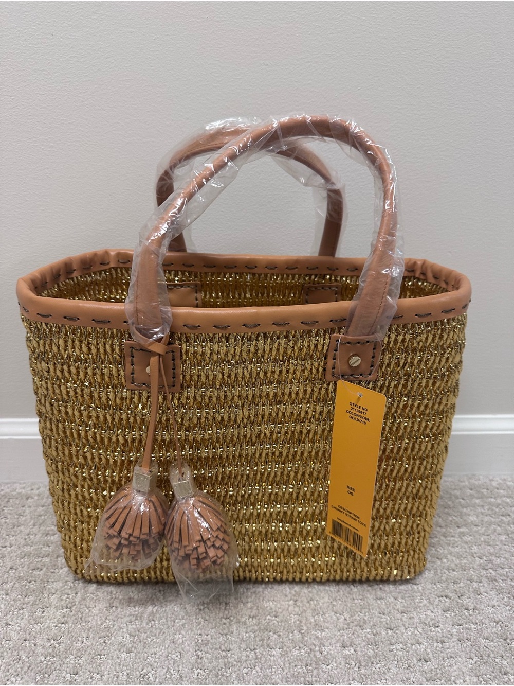 Tory Burch Chunky Straw Tote with Tassel Accents in Gold.